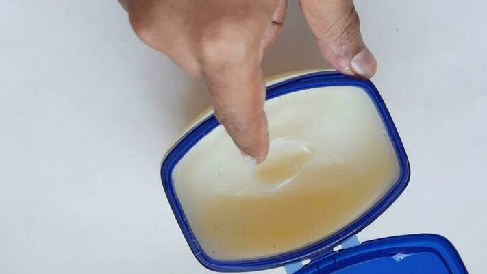 top-view-of-man-hand-using-petroleum-jelly-video